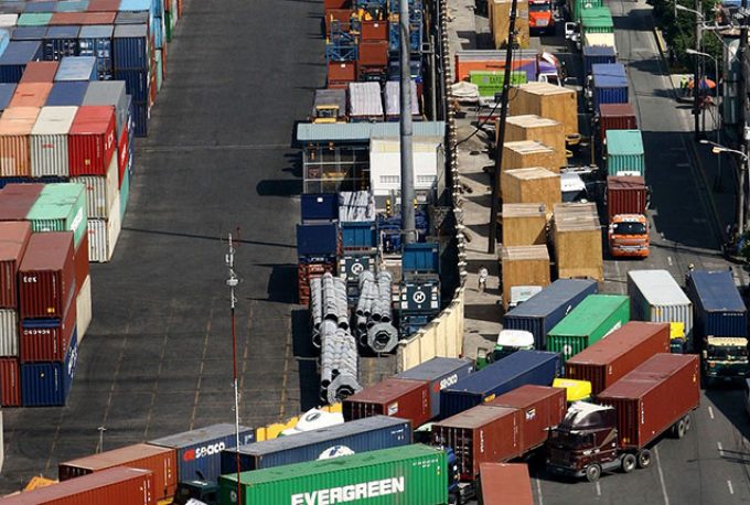 Empty box pile-up at port of Manila sparks truckers' strike